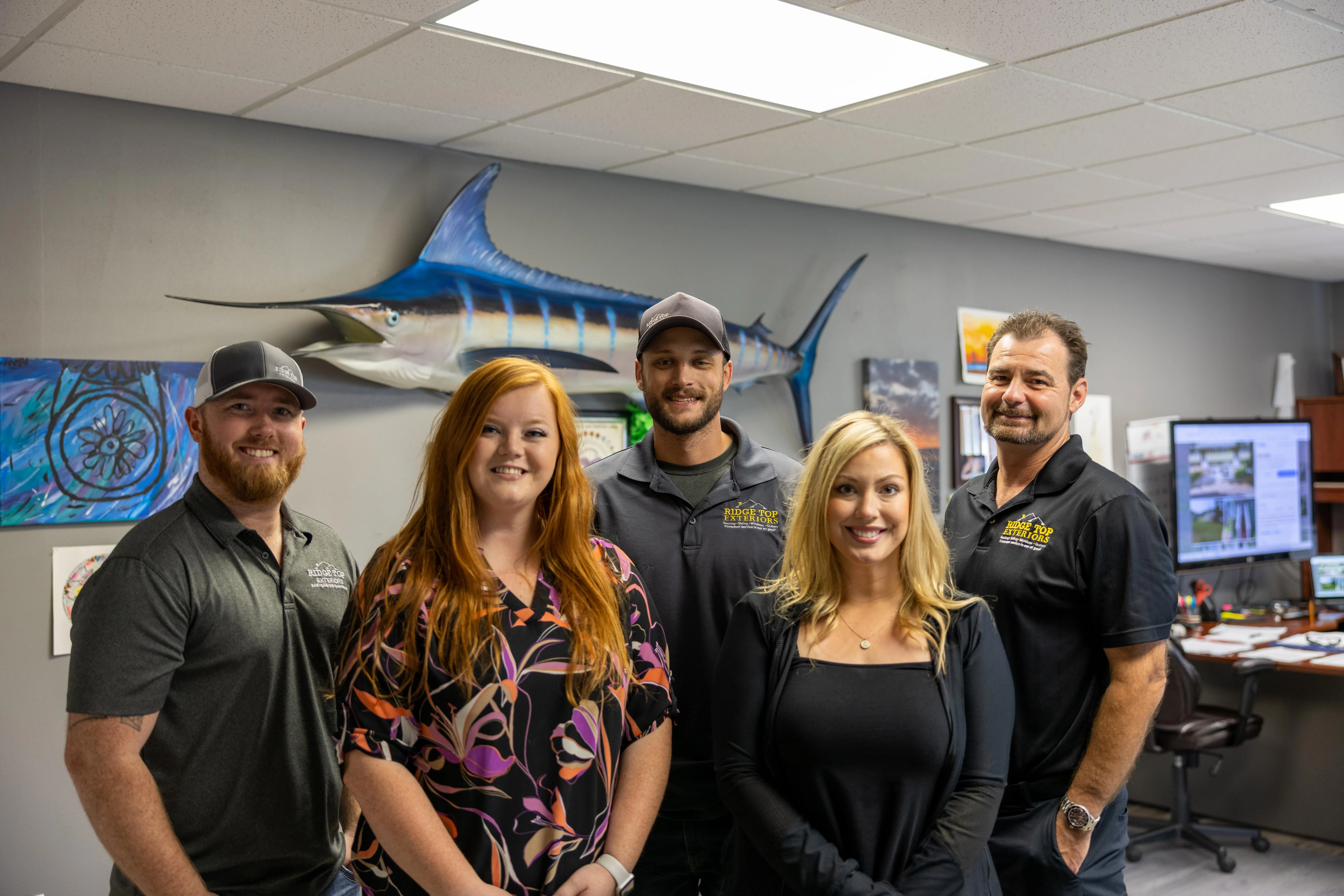A group photo showing Ridge Top Exteriors Madison management team. 